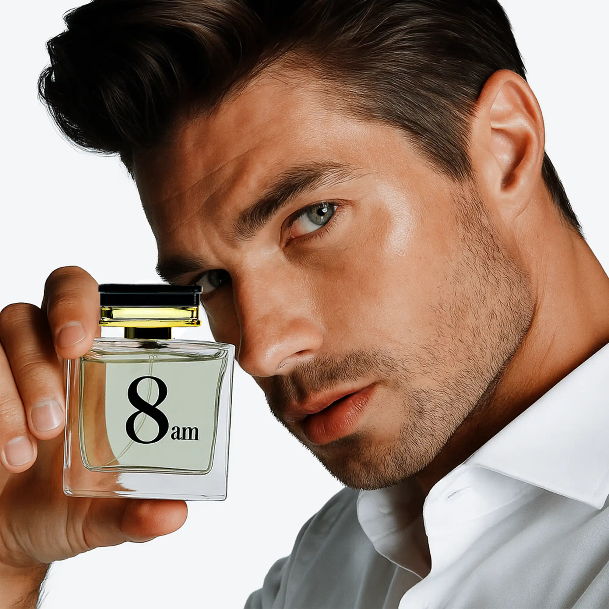 Close-up of man holding 8 AM perfume bottle with modern style